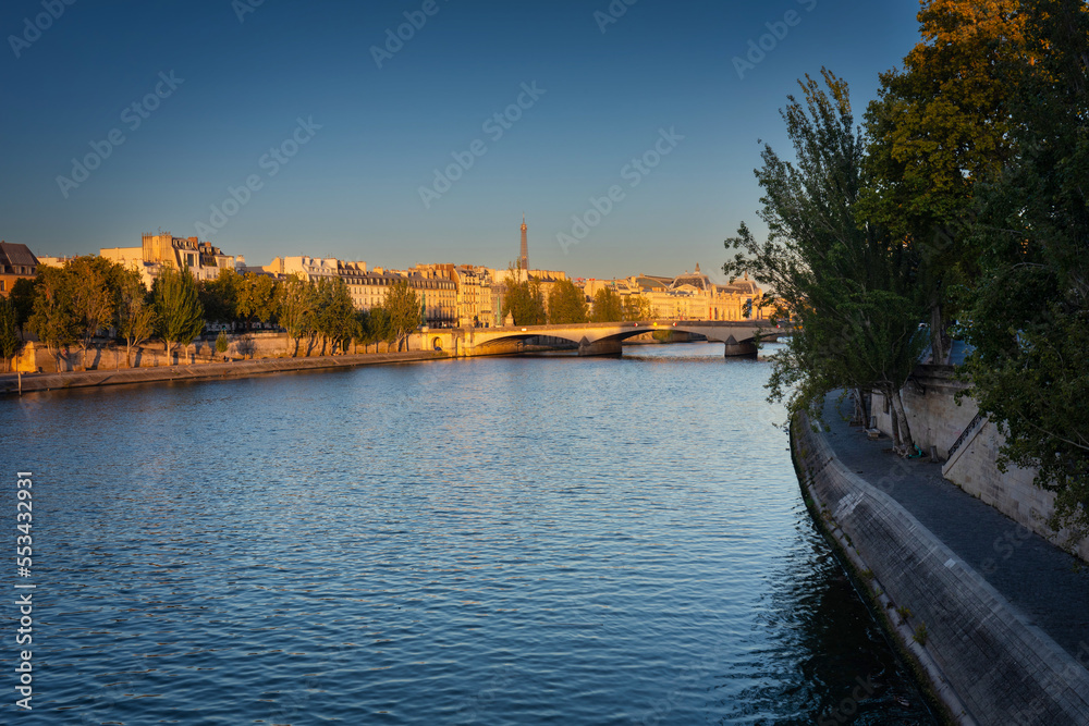 Cityscape of Paris by the Seine river at sunrise. France