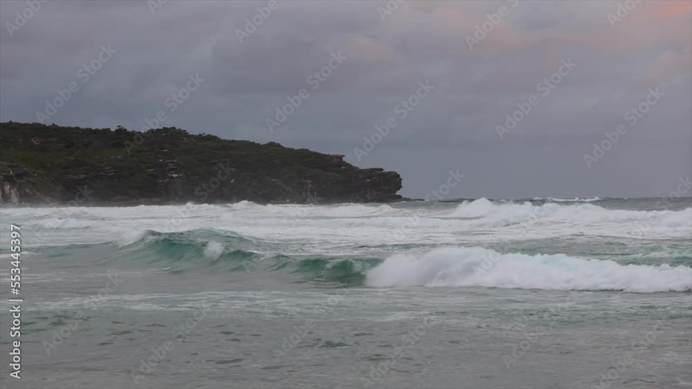 Wave in the ocean with cloudy sky. Wave in the ocean with cloudy sky.