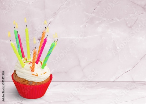 Tasty sweet birthday cake on pink background