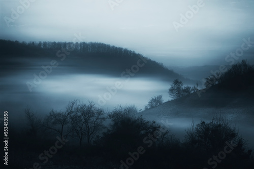 dark foggy hills fantasy landscape