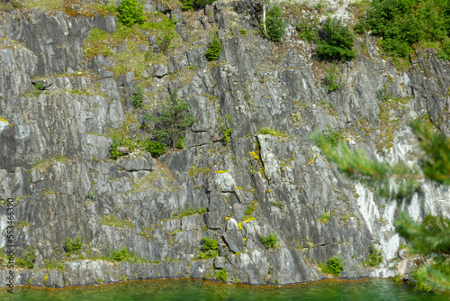 A steep slope of marble canyon in the mountain park Ruskeala, Karelia, Russia