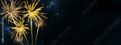 Sylvester, happy new year, new year's eve 2024 background banner - Golden firework fireworks pyrotechnics on dark black night sky