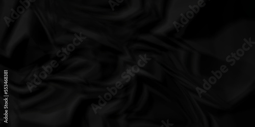 Dark Black facbric paper backdrop crumpled texture. dark black textured crumpled black paper background. panorama black paper texture background, crumpled pattern.