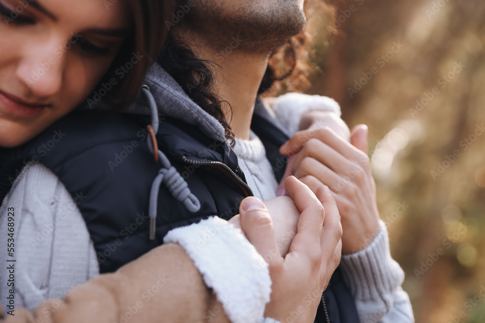 Young couple hugging outdoors, closeup. Dating agency Young couple hugging outdoors, closeup. Dating agency