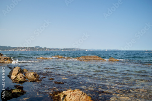 Coastline and sea surf on a sunny day, Cote d'Azur, France