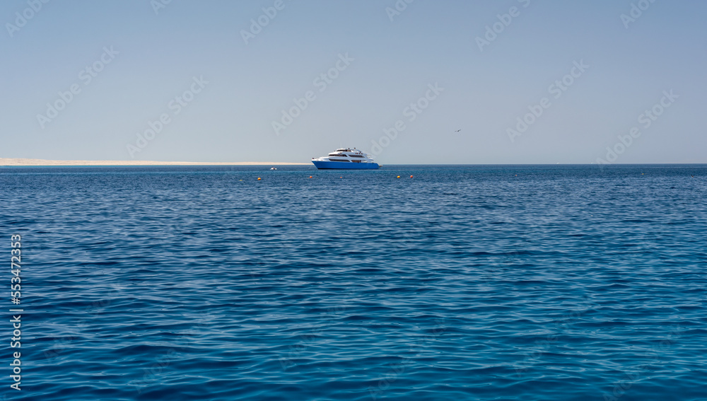 pleasure boat in the blue water of the Red Sea in Egypt