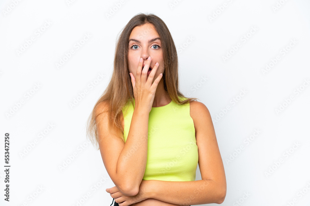 Young caucasian woman isolated on white background surprised and shocked while looking right Young caucasian woman isolated on white background surprised and shocked while looking right