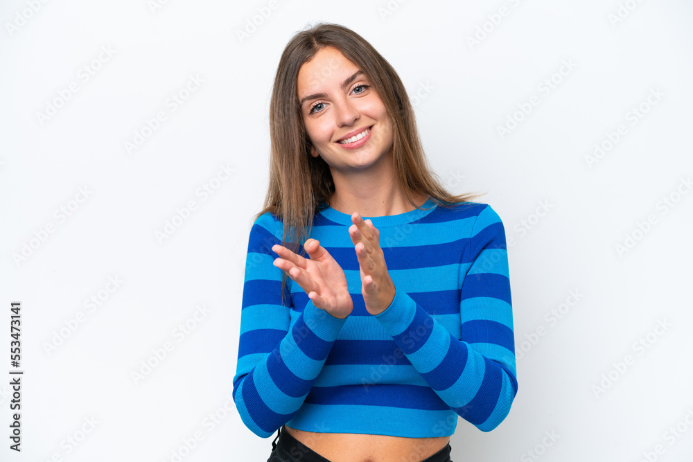 Young caucasian woman isolated on white background applauding after presentation in a conference Young caucasian woman isolated on white background applauding after presentation in a conference