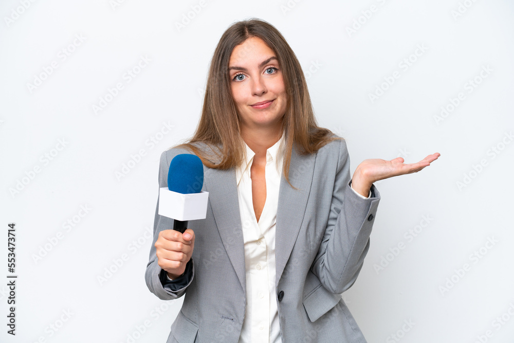 Young TV presenter caucasian woman isolated on white background having doubts while raising hands Young TV presenter caucasian woman isolated on white background having doubts while raising hands