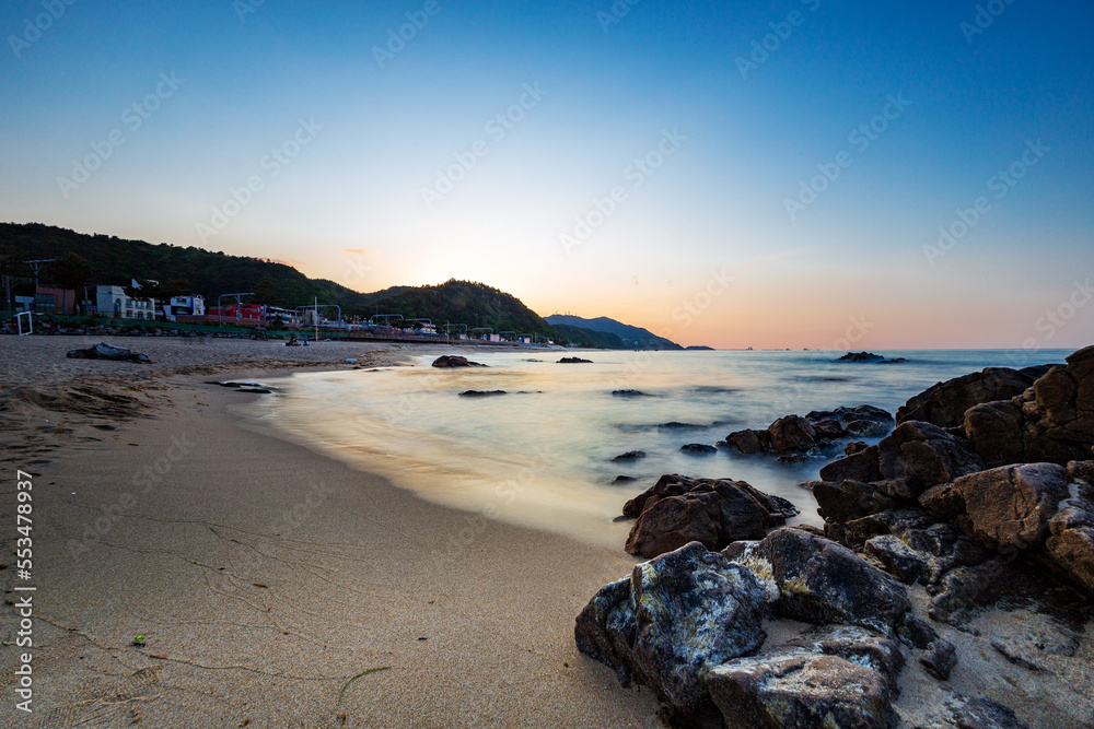 Northern side of Jeongdongjin Beach at dusk, Gangneung, Gangwon-do,South Korea. Long exposure.
