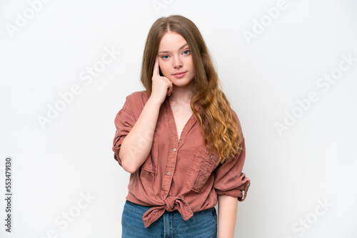 Young pretty woman isolated on white background thinking an idea
