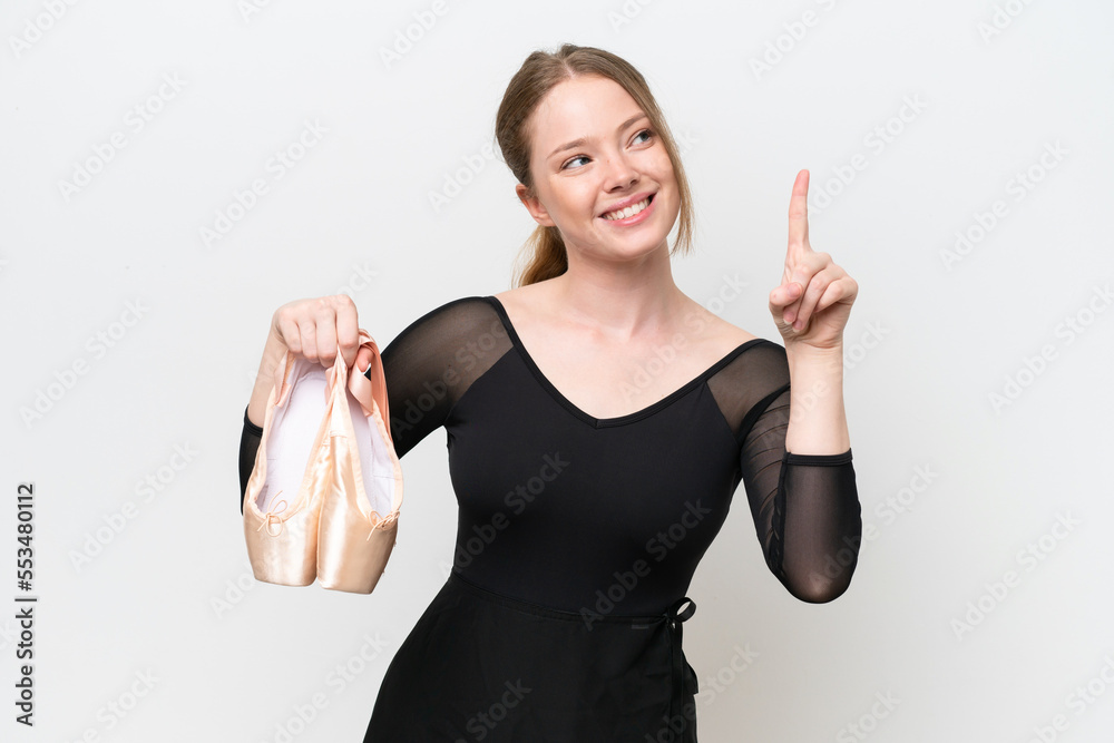 Young woman practicing ballet isolated on white background pointing up a great idea Young woman practicing ballet isolated on white background pointing up a great idea