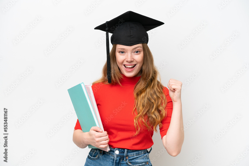 Young university graduate woman isolated on white background celebrating a victory in winner position Young university graduate woman isolated on white background celebrating a victory in winner position