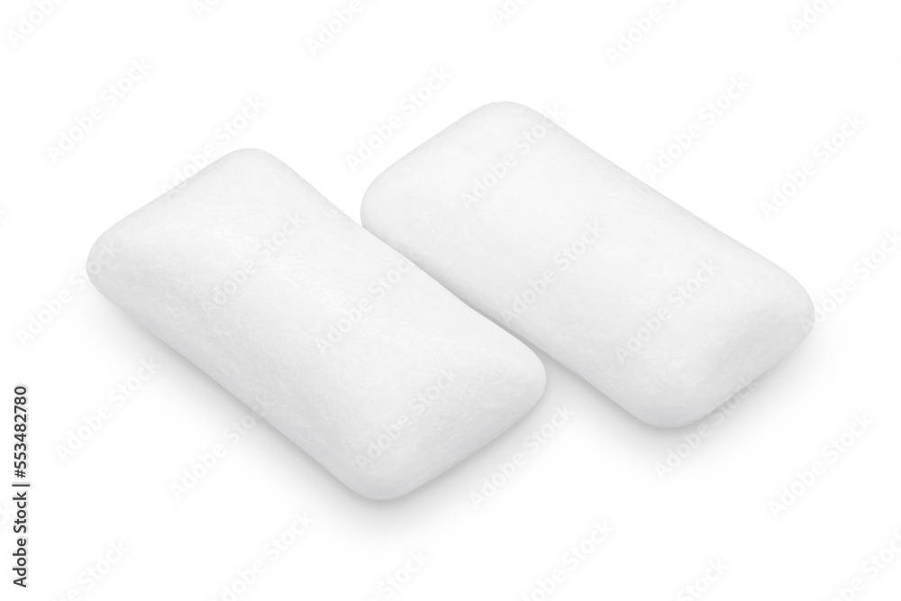 Three pieces of white chewing gum isolated on white. The whole subject is in focus. Three pieces of white chewing gum isolated on white. The whole subject is in focus.