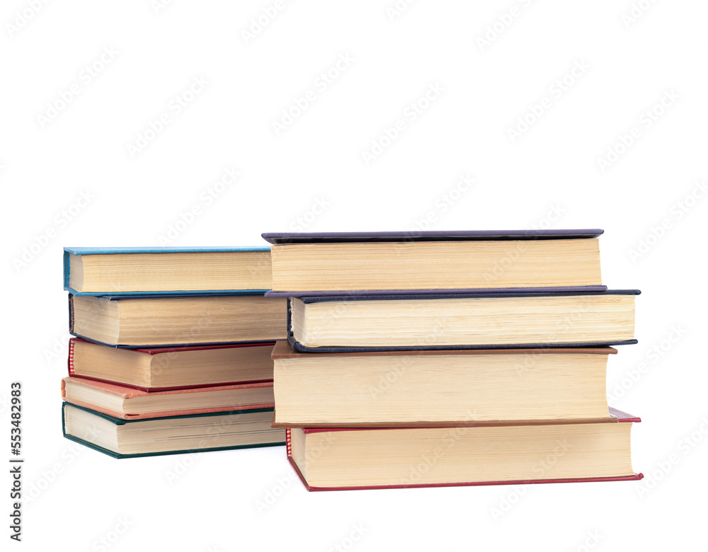 Two stacks of hardback books on a white background. Two stacks of hardback books on a white background.