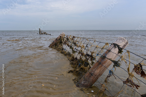 Fence on the beach at schillig photo