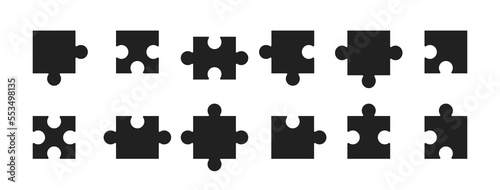 Puzzle pieces vector. Puzzle black icon set. photo