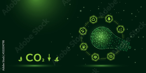 Reduction of CO2 emissions into atmosphere, environmental protection, carbon neutrality, concept of ecology. Symbolic light bulb surrounded by renewable energy icons on dark green background