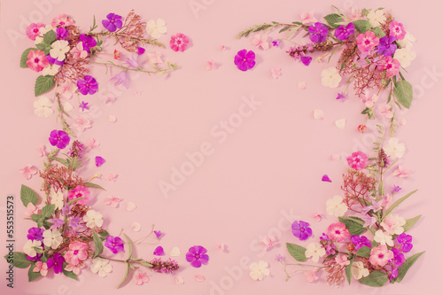 pattern of summer flowers on color paper background