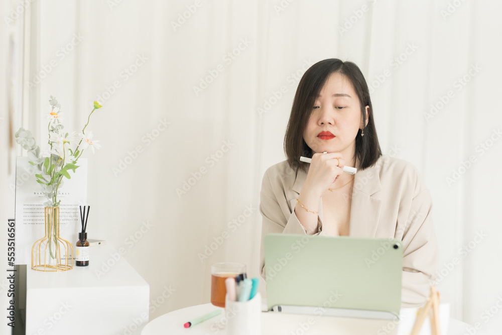 asian business and writer woman during think new her idea and meeting online asian business and writer woman during think new her idea and meeting online