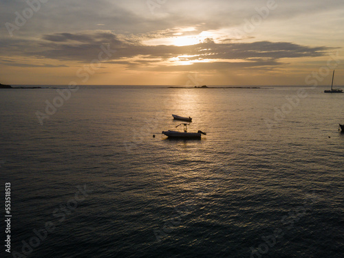 Beautiful aerial view of a sunset in the beach of Tamarindo Costa Rica in Guanacaste © Gian