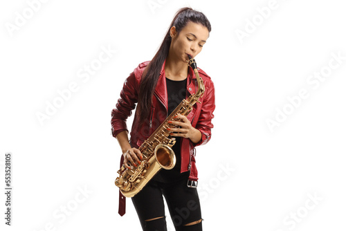 Bild auf Leinwand Beautiful young woman playing a saxophone