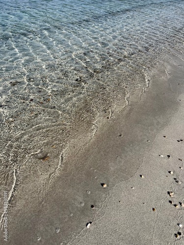 Transparent sea surface, azure sea water, beautiful sea background, sea horizon photo