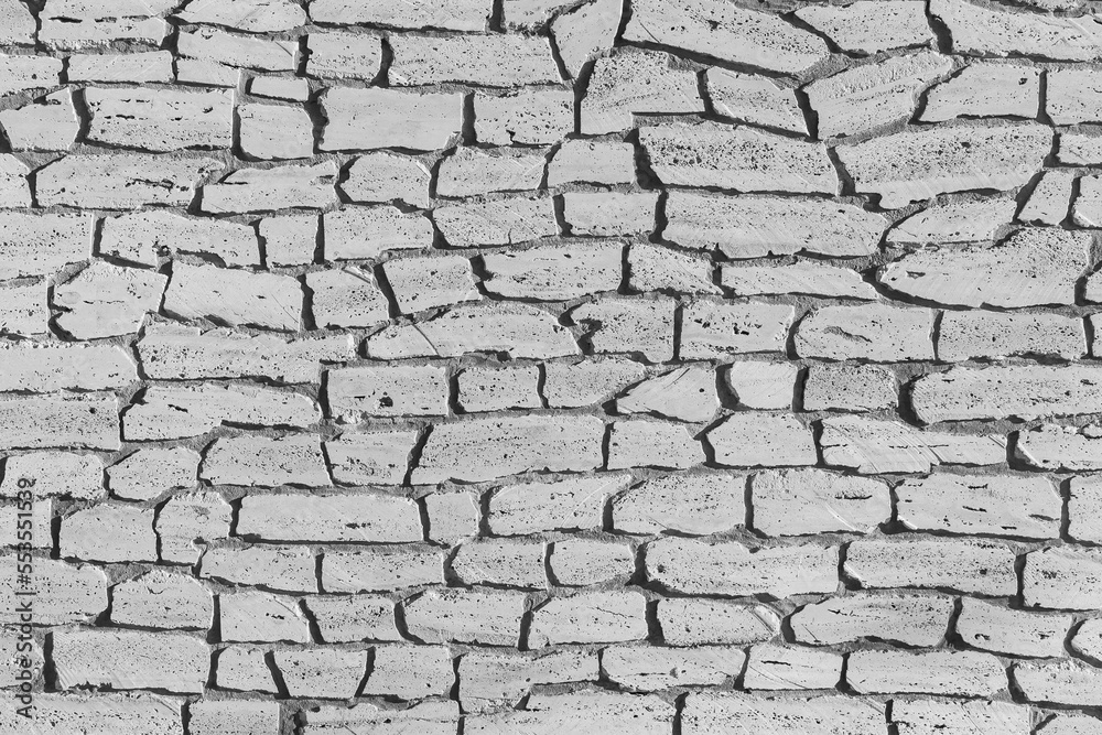 Light white grey stone brick wall, modern texture masonry pattern background abstract