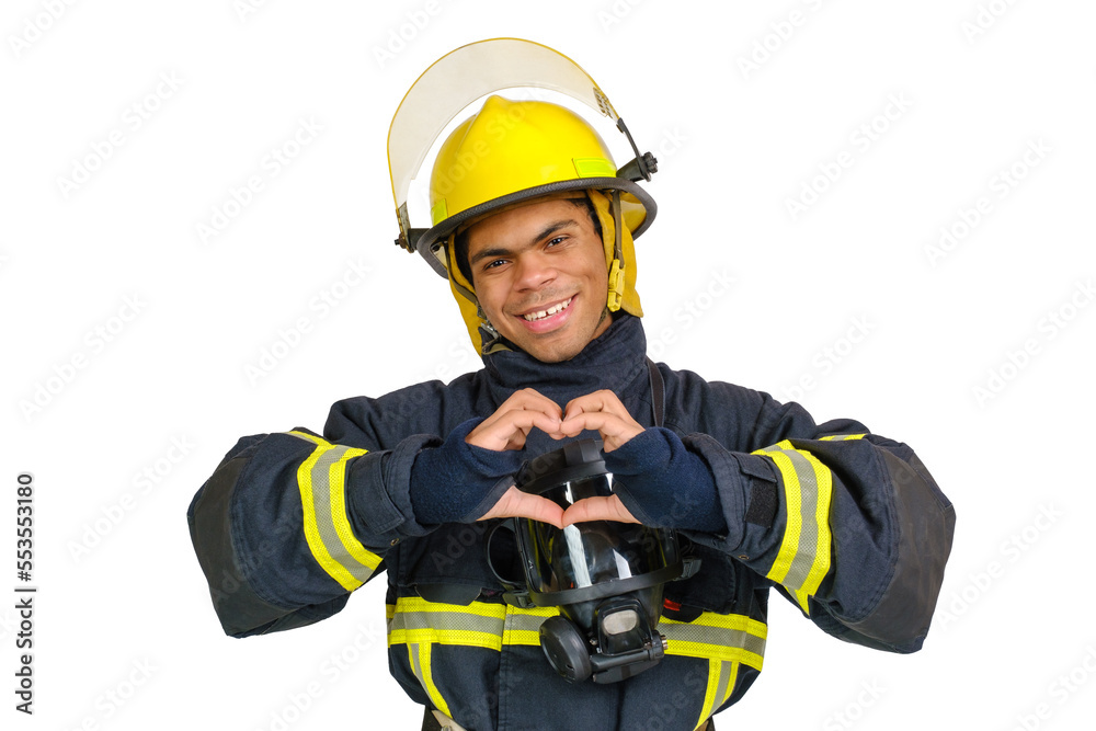 Young smiling African American fireman in uniform and helmet showing heart sign with fingers and looking at camera isolated on white background Young smiling African American fireman in uniform and helmet showing heart sign with fingers and looking at camera isolated on white background