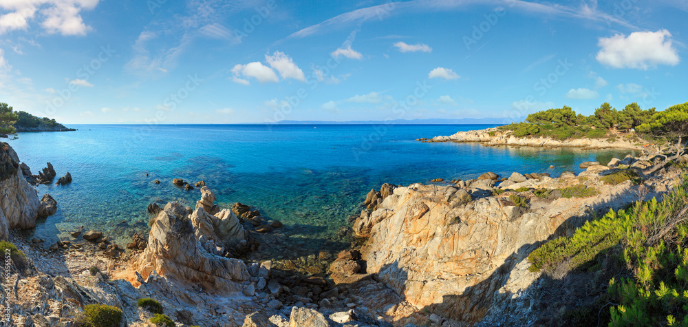 Aegean sea coast landscape evening view near Mega Portokali Beach (Sithonia, Chalkidiki, Greece). People are unrecognizable. Aegean sea coast landscape evening view near Mega Portokali Beach (Sithonia, Chalkidiki, Greece). People are unrecognizable.