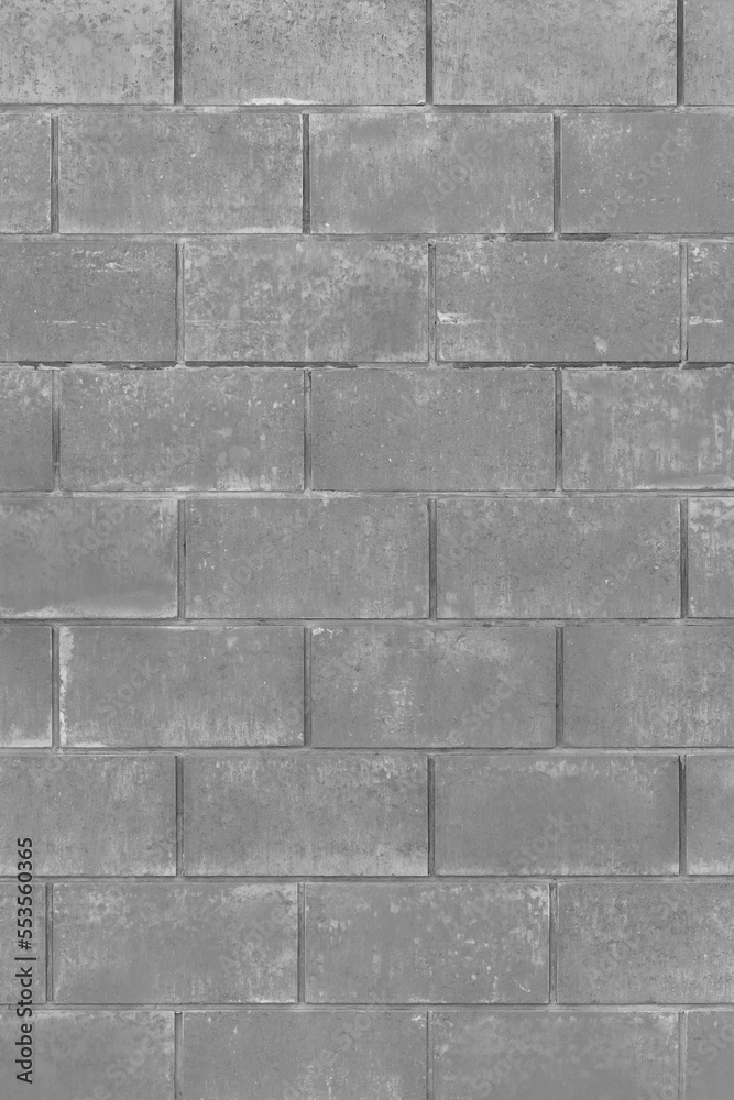 Obraz premium Grey paint on brick vertical blocks urban gray design wall texture background monochrome architecture