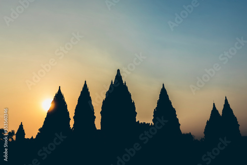 Sunset at Prambanan Temple with silhouetted peaks; Yogyakarta, Indonesia photo