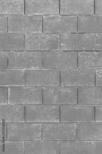 Grey paint on brick vertical blocks urban gray design wall texture background monochrome architecture