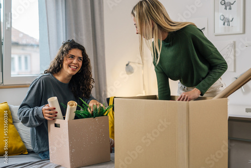 Two European students move into a dormitory together