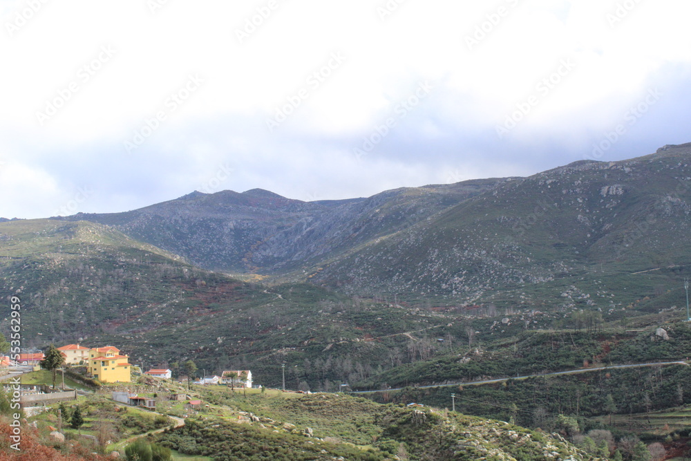 View from the top of the mountains of the Serra da Estrela natural park, village of Sabugueiro. Cloudy and rainy day. 