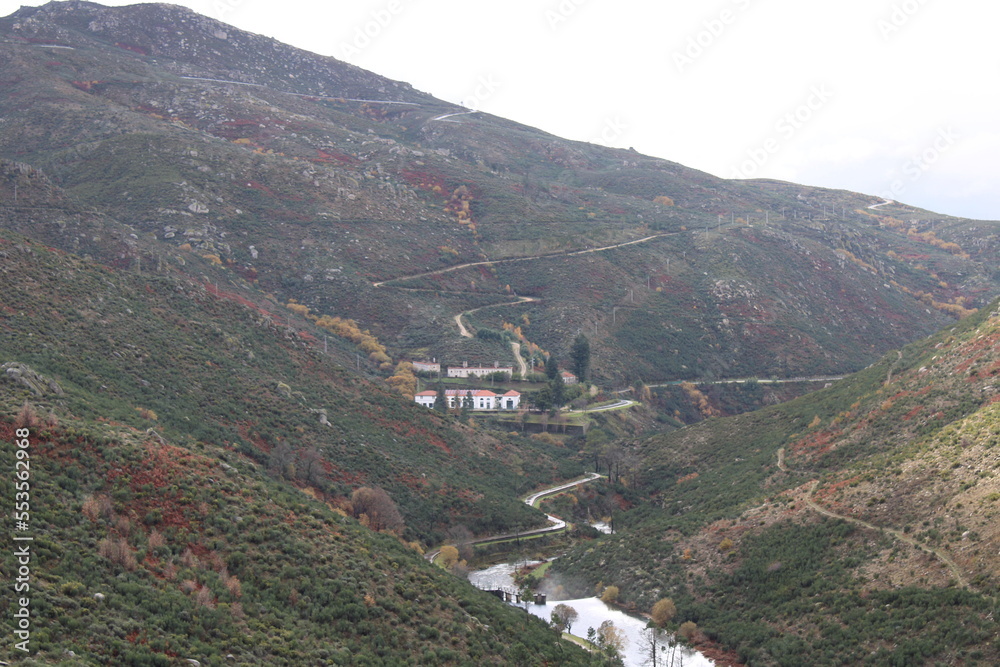 View from the top of the mountains of the Serra da Estrela natural park, village of Sabugueiro. Cloudy and rainy day. 