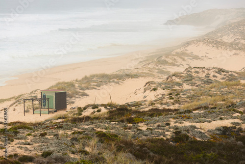 Praia do Malhao along the Alentejo coastline with misty air; Alentejo, Portugal photo