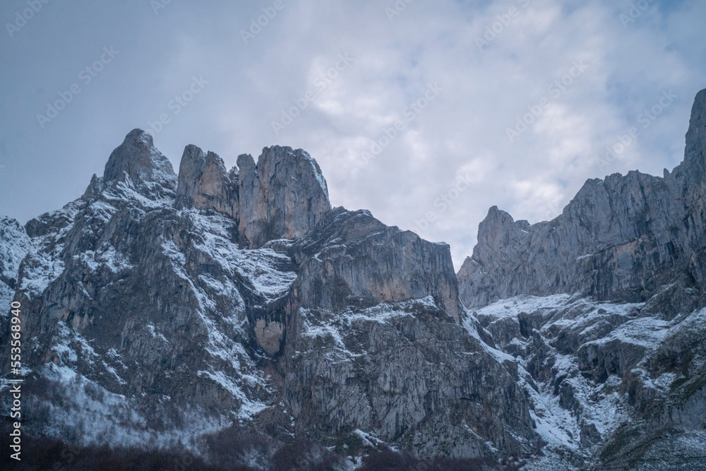 landscape view of the mountains covered in snow in winter (Picos de Europa National Park, Spain)