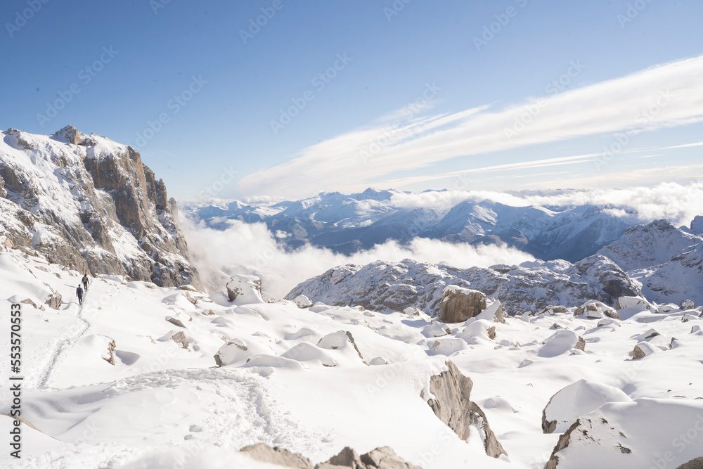 high mountains covered in snow in Picos de Europa National Park, Spain