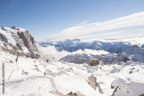 high mountains covered in snow in Picos de Europa National Park, Spain © urdialex