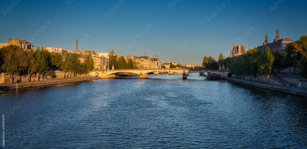 Cityscape of Paris by the Seine river at sunrise. France