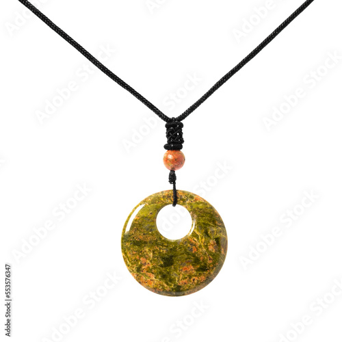 Necklace pendant made of unakite natural stone on a white isolated background. Isoteric, protection. photo