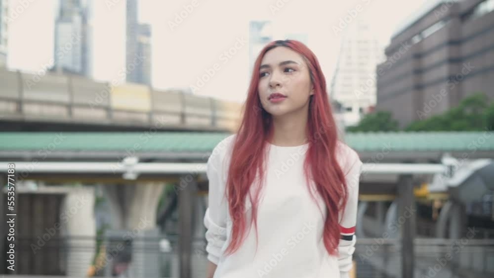 Holiday concept of 4k Resolution. Asian woman walking in the city. teenage girl fashion. Holiday concept of 4k Resolution. Asian woman walking in the city. teenage girl fashion.