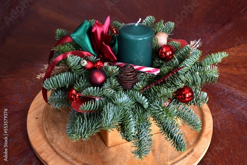 Christmas table arrangement with candle. Centerpieces. Table decor.