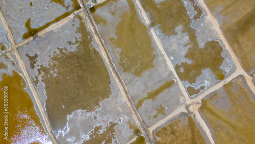 Fotografie Aerial shot of Salinas de Cáhuil and Laguna Cáhuil (Pichilemu) – Chile