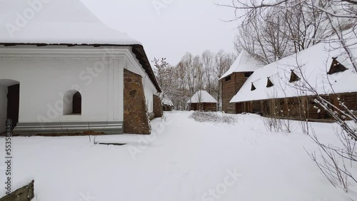 Sotnyk's House in winter Mamajeva Sloboda Cossack Village, Kyiv, Ukraine photo