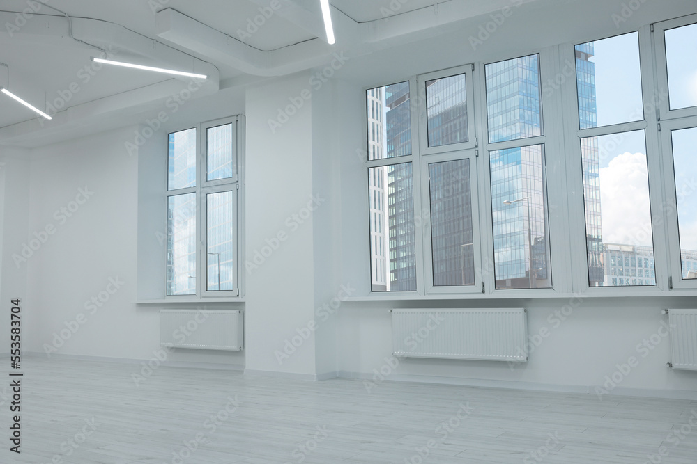 Fototapeta premium New empty room with clean windows and white wall
