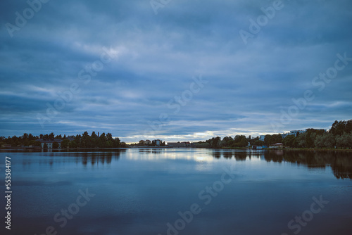 Relaxing view of a river and clouds in the sky © Matti