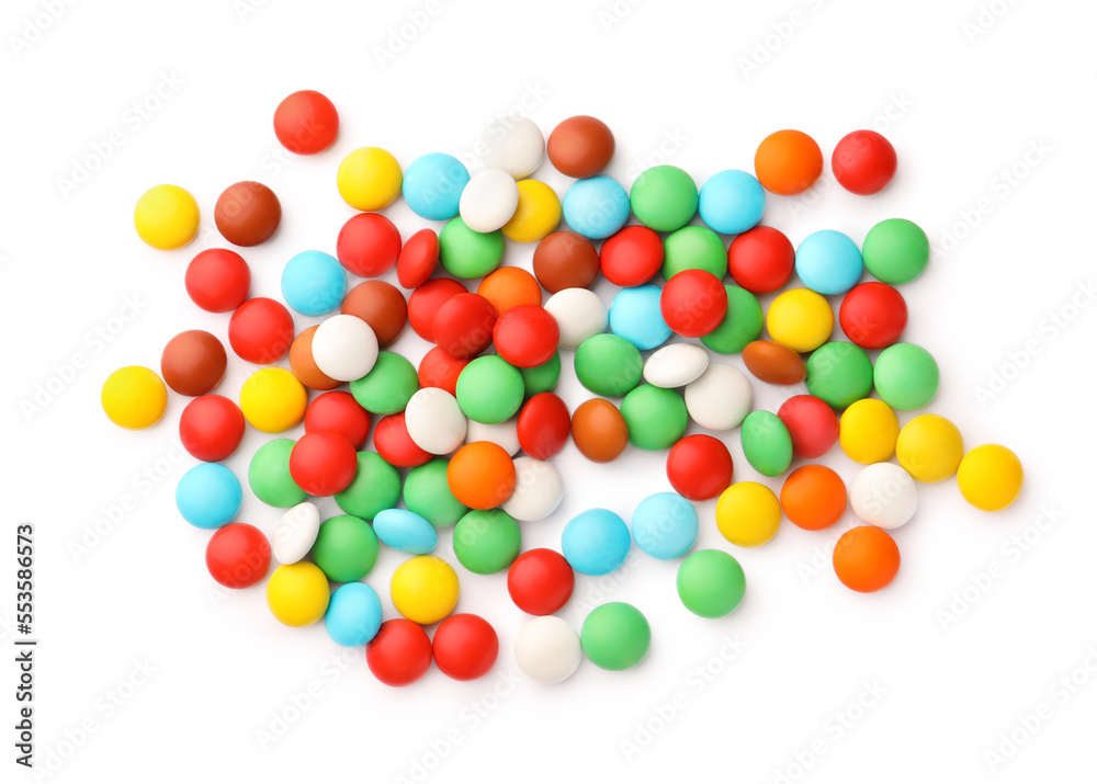 Many small colorful candies on white background, top view Many small colorful candies on white background, top view
