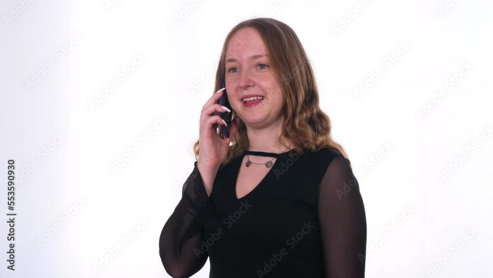 communication, youth - smiling girl chatting with her friend on cellphone communication, youth - smiling girl chatting with her friend on cellphone